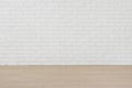 Empty room with white brick wall and laminated flooring board Royalty Free Stock Photo