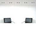 Empty room with white table and 2 working chairs Royalty Free Stock Photo
