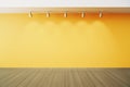 Empty room with yellow wall with lapms and wood floor Royalty Free Stock Photo