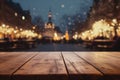 Empty rough wooden table in front of a Christmas market at Xmas time, blurred bokeh lights background. Royalty Free Stock Photo