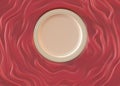 Empty round glazed plate with simple shiny frame on folded silk cloth. Royalty Free Stock Photo