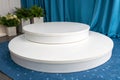 Empty Round White Platforms on Blue Background Royalty Free Stock Photo