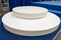 Empty Round White Platforms on Blue Background Royalty Free Stock Photo