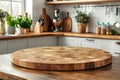 Empty round wood tabletop counter on interior in clean and bright kitchen background Royalty Free Stock Photo