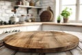 Empty round wood tabletop counter on interior in clean and bright kitchen background. Royalty Free Stock Photo
