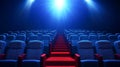 Empty Rows of Modern Theater Seats in Soft Natural Light with Spotlight Shining Down the Aisle Royalty Free Stock Photo