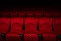 Empty rows of red theater or movie seats