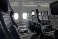 Empty Rows of Seats on a Commercial Airliner Jet Royalty Free Stock Photo