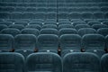 Empty rows of seats in the hall for a large number of people. Cinema and theatre hall for watching performances. Royalty Free Stock Photo