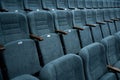 Empty rows of seats in the hall for a large number of people. Cinema and theatre hall for watching performances. Royalty Free Stock Photo