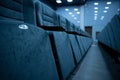 Empty rows of seats in the hall for a large number of people. Cinema and theatre hall for watching performances. Royalty Free Stock Photo