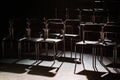 Empty rows in small dark audience hall in projector backlight