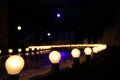 Empty Runway Fashion Show with Ball glowing lighting along walk way Royalty Free Stock Photo