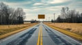 Empty Rural Road Leading To A Blank Billboard Under A Cloudy Sky With Barren Trees And Dry Fields