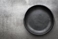 Empty Rustic Black Plate over Slate Royalty Free Stock Photo