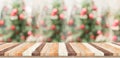 Empty rustic wood plank table top with abstract blur christmas t Royalty Free Stock Photo