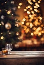 Empty rustic wooden table with christmas tree and bokeh background