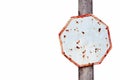 Empty rusty and grungy white and red old road traffic sign in octagon shape