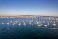 Empty sailboats docked in San Diego bay in front of Coronado Bridge Royalty Free Stock Photo