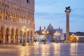 Empty San Marco square with Doge palace and column with lion in Venice