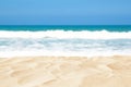 Empty sand beach in front of summer sea background with copy space Royalty Free Stock Photo