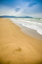 Empty sand beach in Paestum in cloudy day in winter, Cilento, Italy