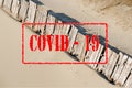 Empty sandy beach closed due to coronavirus or covid 19 virus pandemic safety social distancing lock down