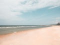 Empty sandy tropical beach. wide beach on island. copy space provided.