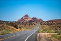 Empty scenic highway in Arizona, USA. Natural american landscape with asphalt road to horizon. Desert highway at sunset