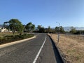 Empty scenic long straight desert road with yellow marking lines. ÃÂ ÃÂÃÂ¡alifornia