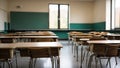 School classroom without young student. Blurry view of elementary class room no kid or teacher with chairs and tables in Royalty Free Stock Photo