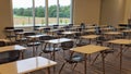 Empty school desks in classroom Royalty Free Stock Photo