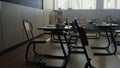Empty school room. Interior of classroom with desks and chairs for education Royalty Free Stock Photo