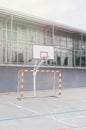 Soccer goal and a basketball hoop in a school playground