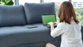 Empty Screen laptop Blogger Woman hands typing computer keyboard. Close up women hands using laptop sitting at sofa in living room Royalty Free Stock Photo