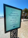 Empty sea port of San Diego with informative signage during COVID-19 pandemic.