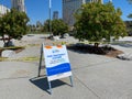 Empty sea port of San Diego with informative signage during COVID-19 pandemic.