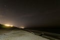 Empty sea sandy beach at night. Starry night sky with Big Dipper Constellation. Royalty Free Stock Photo