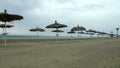 Empty seaside beach, cold weather at popular summer resort during low season