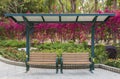 Empty seat in flower garden Royalty Free Stock Photo