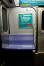 Empty seat inside a Manhattan Subway car.