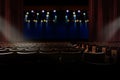 Empty vintage auditorium or theater with lights on stage Royalty Free Stock Photo