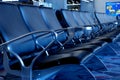 Empty Seats at Airport Gate