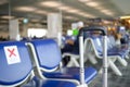 Empty seats on airport under Covid-19 pandemic Royalty Free Stock Photo