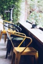 Empty seats at coffee shop, wooden counter table Royalty Free Stock Photo
