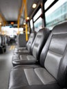 Empty seats on a modern city bus interior. Royalty Free Stock Photo