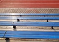 Empty seats in school stadium Royalty Free Stock Photo