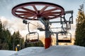 Empty seats at skilift in winter resort Royalty Free Stock Photo