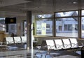 Empty seats in terminal waiting room in airport Royalty Free Stock Photo