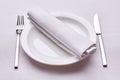 Empty served restaurant table with white tablecloth Royalty Free Stock Photo